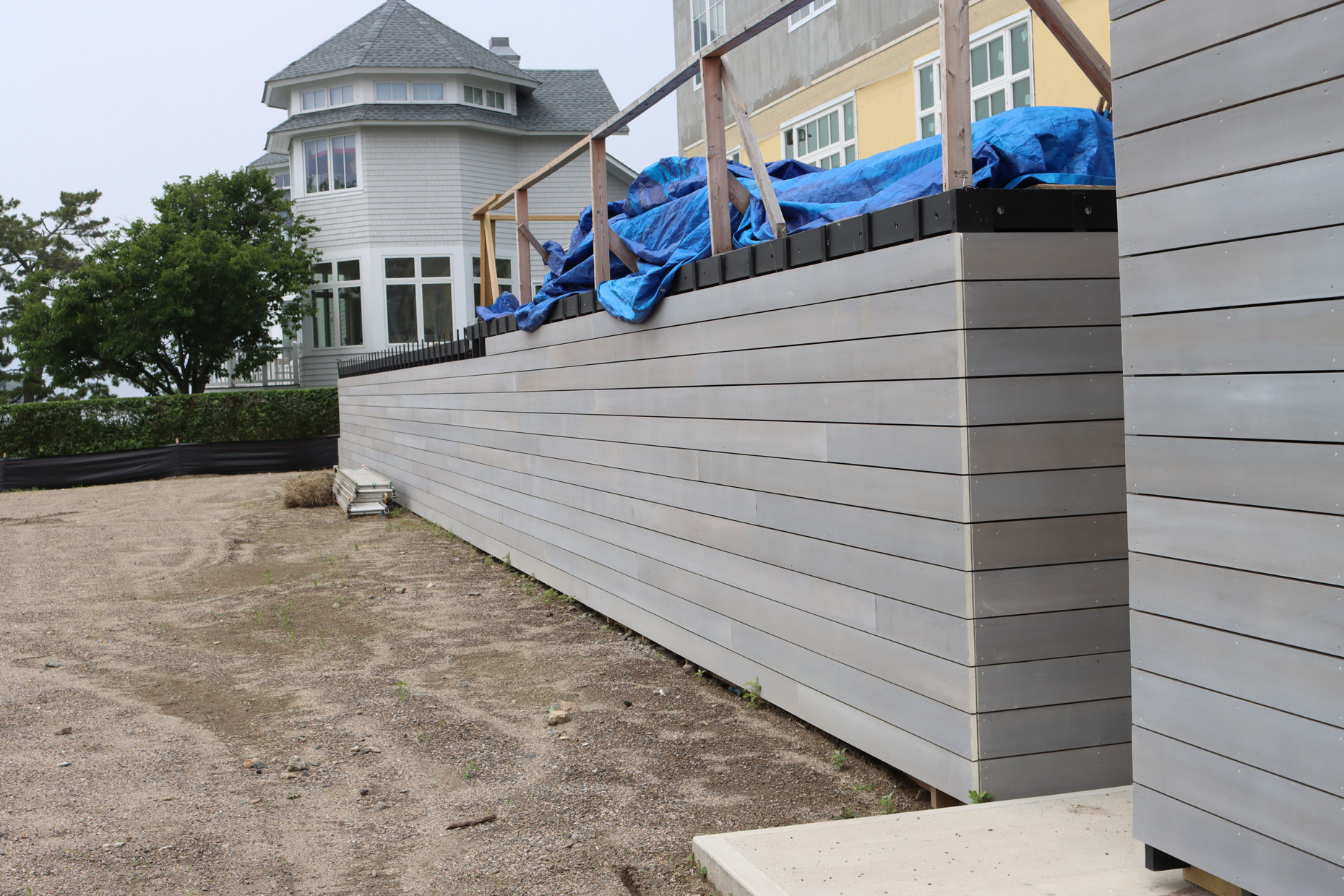 Greenwich Cove Residence featuring WILLIWAW weathered Alaskan Yellow Cedar Exterior Siding, Interior Cladding, and Roof Cladding