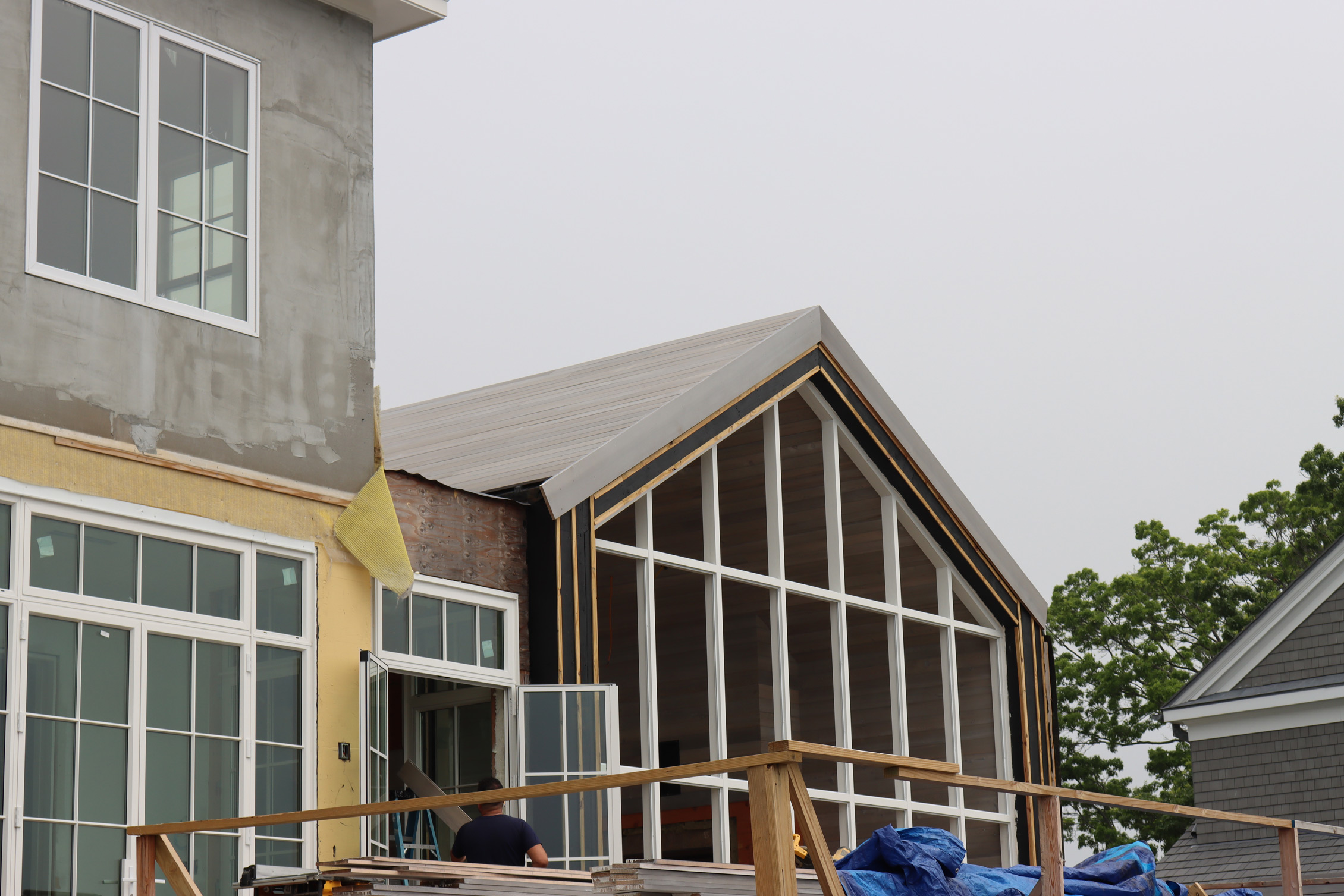 Greenwich Cove Residence featuring WILLIWAW weathered Alaskan Yellow Cedar Exterior Siding, Interior Cladding, and Roof Cladding