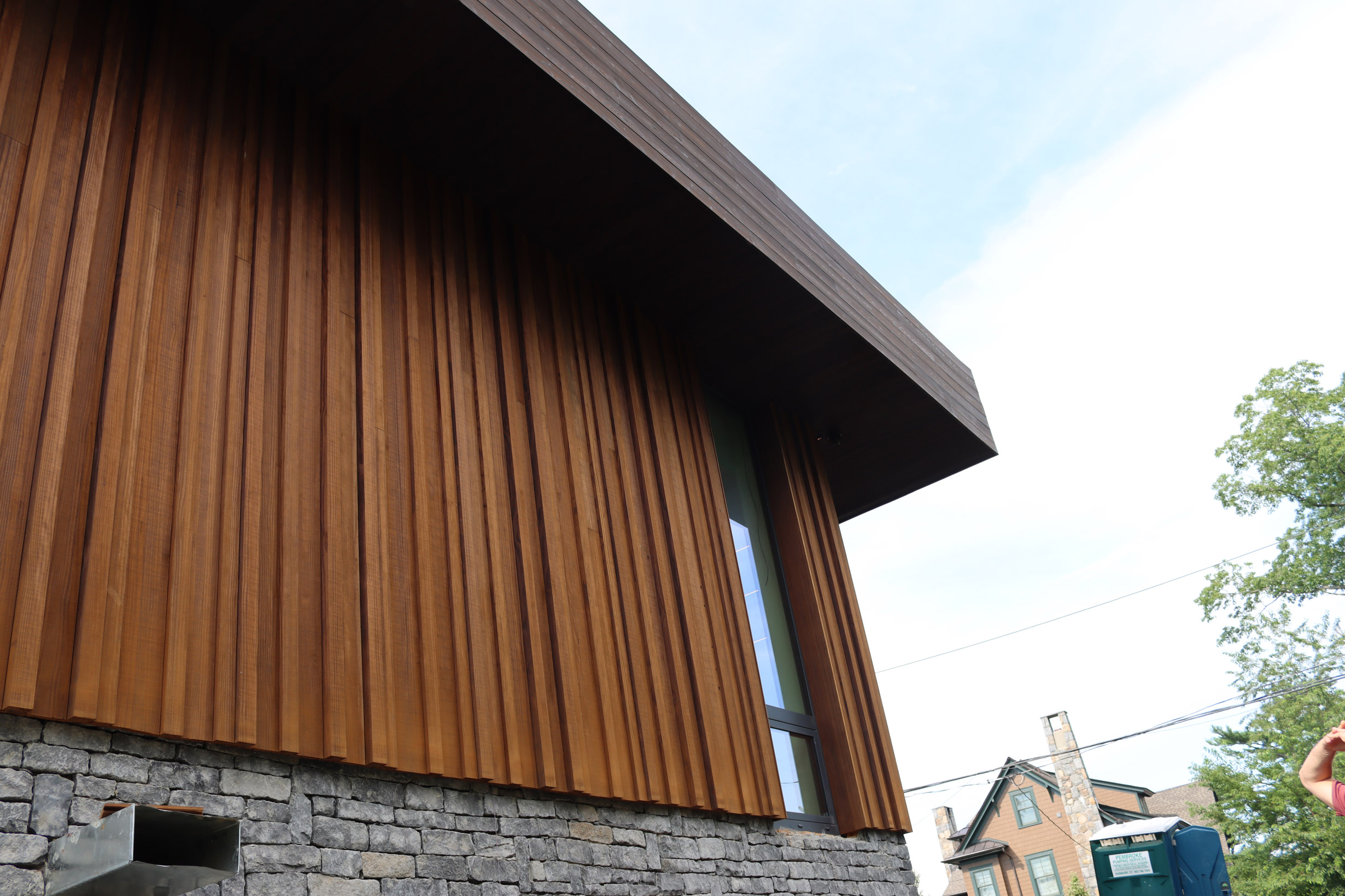 New Fairfield Lake Home featuring TEAK Abodo Vulcan Cladding and PONZU shou sugi ban charred cypress exterior cladding/siding and slats