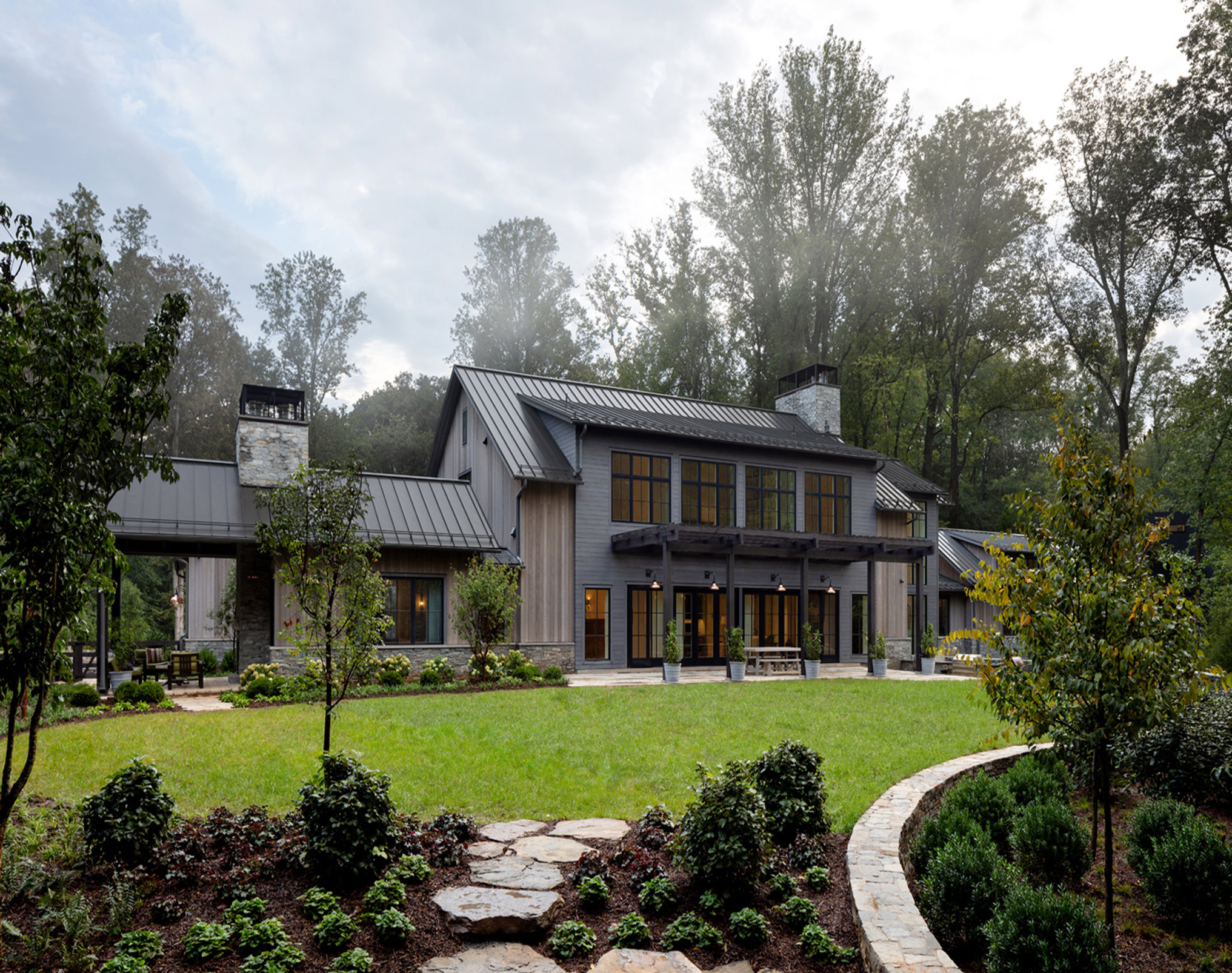 The Millwood Residence ft ZEPHYR and SURETO exterior wood cladding and ZEPHYR weathered Atlantic White Cedar exterior cladding